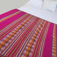 Andean blanket, fuchsia over bed, manta, Peruana, rosa, Cuzco