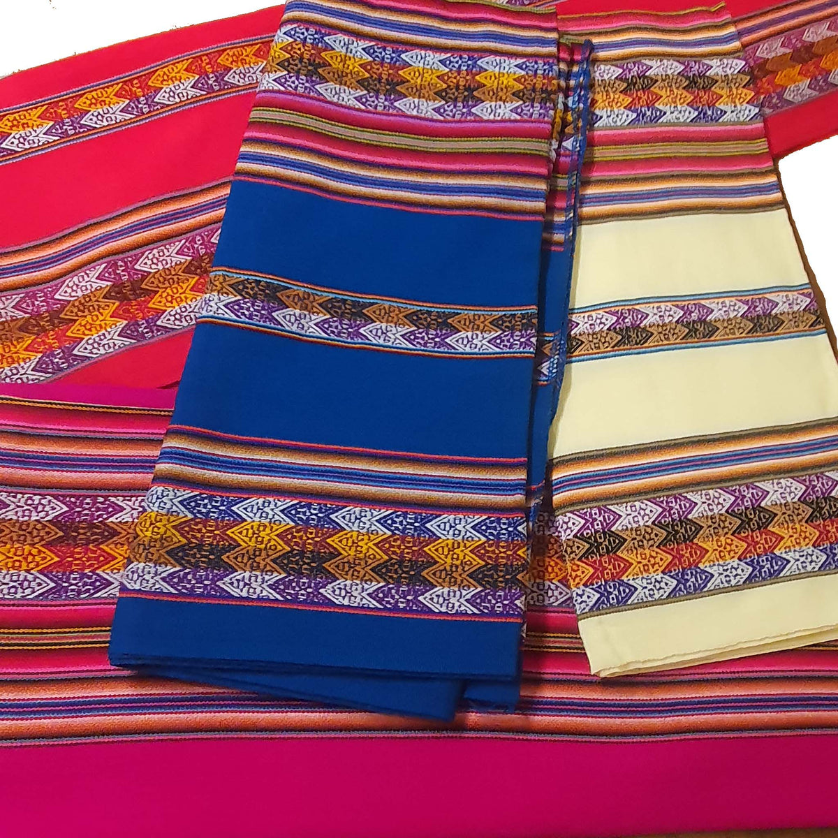 Andean blankets, turquoise, ivory, red, fuchsia, hot pink