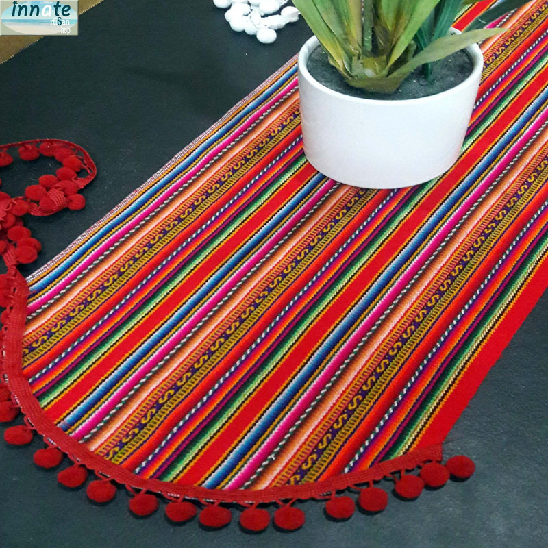 Red table runner with pot