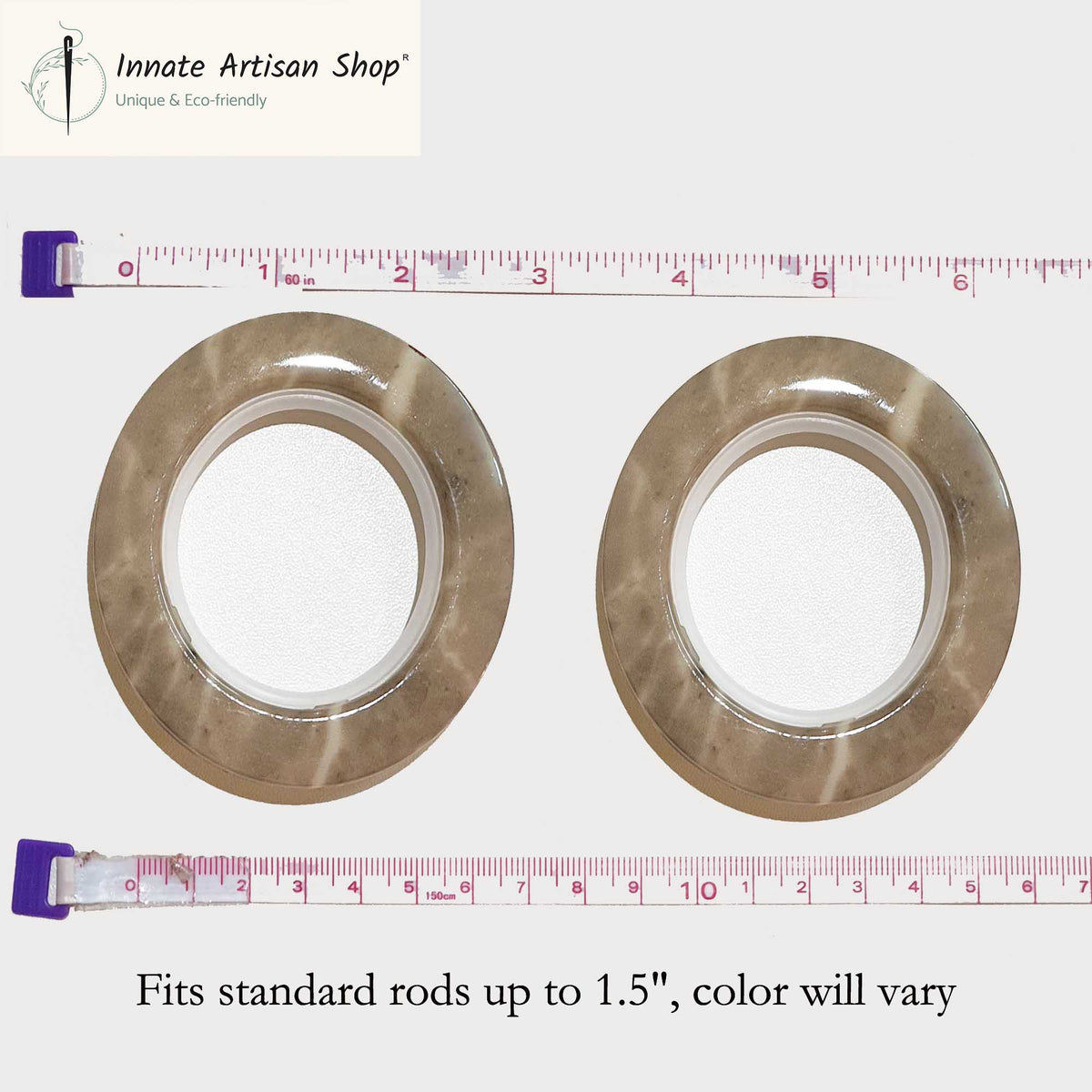 Two metallic washers with a ruler showing their size on a white background, branded 'Innate Artisan Shop'.