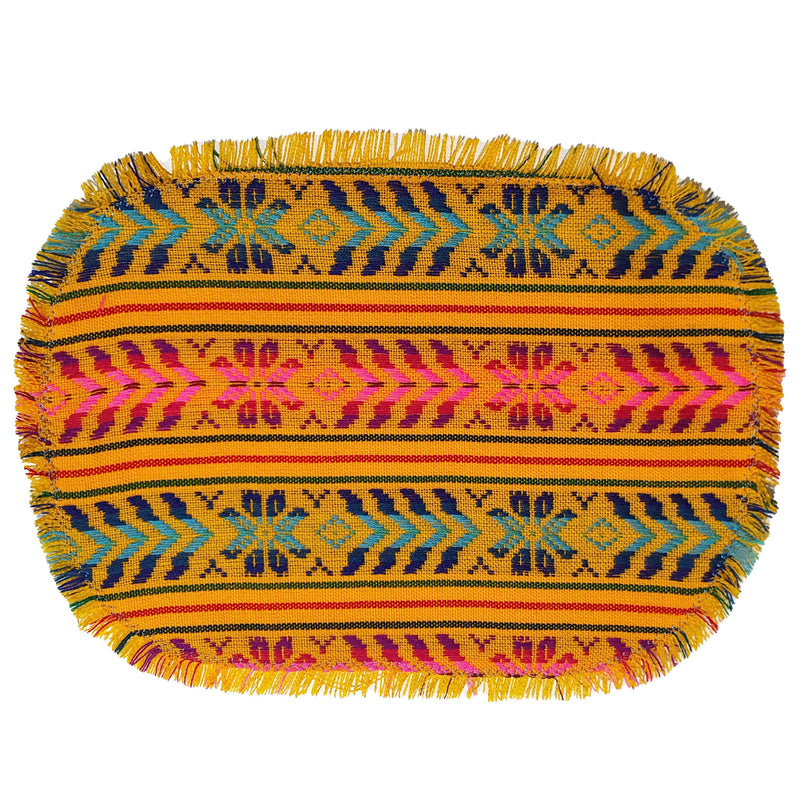 Colorful woven placemat with geometric pattern on a white background