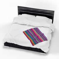 fleece blanket, gender neutral, purple stripes, throw blanket, top of queen size bed