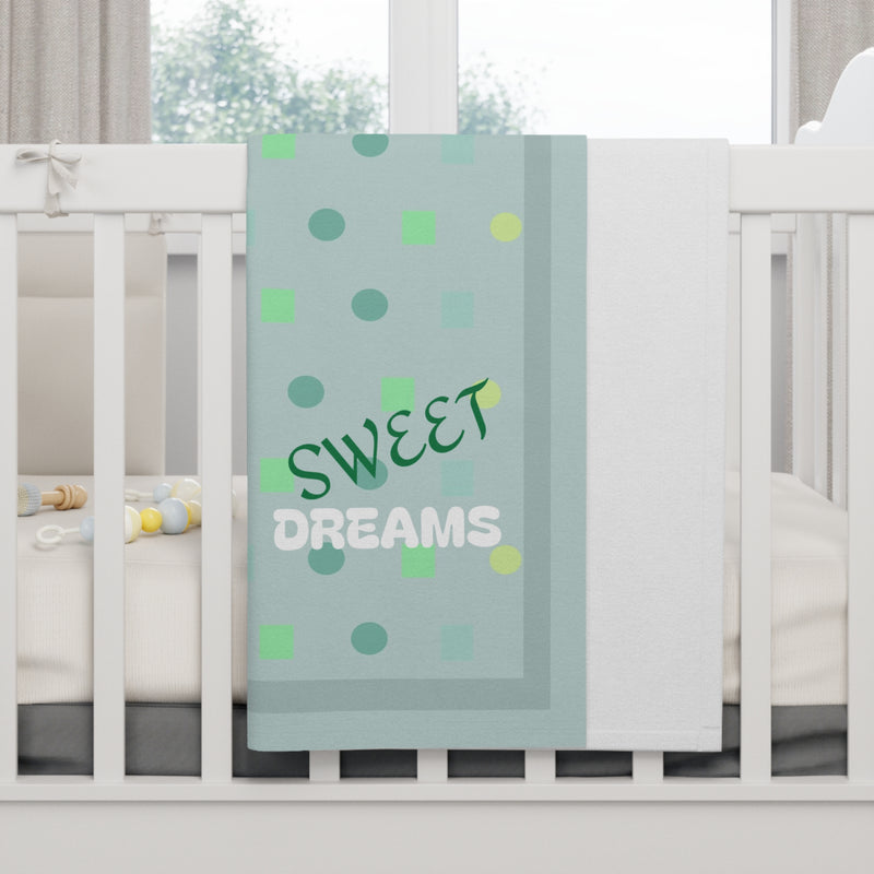 baby blanket, personalized, over a crib rail