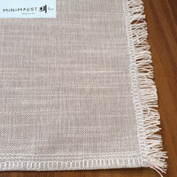 Table runner, greige, khaki, beige, sand, light taupe, decorative sides and small fringes, minimalistave, minimalist, minimalistave.com